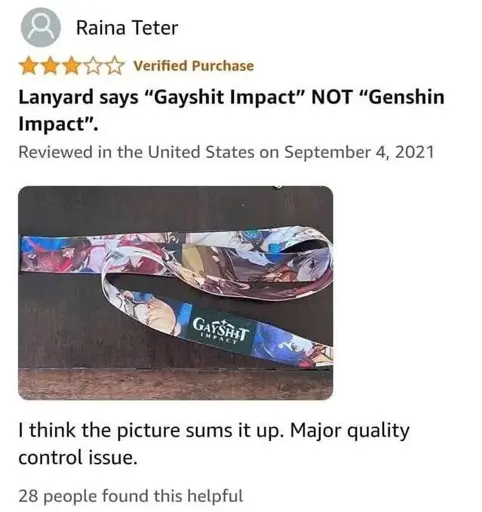 Three star Amazon review: "Lanyard says Gayshit Impact NOT Genshin Impact" with a corresponding picture